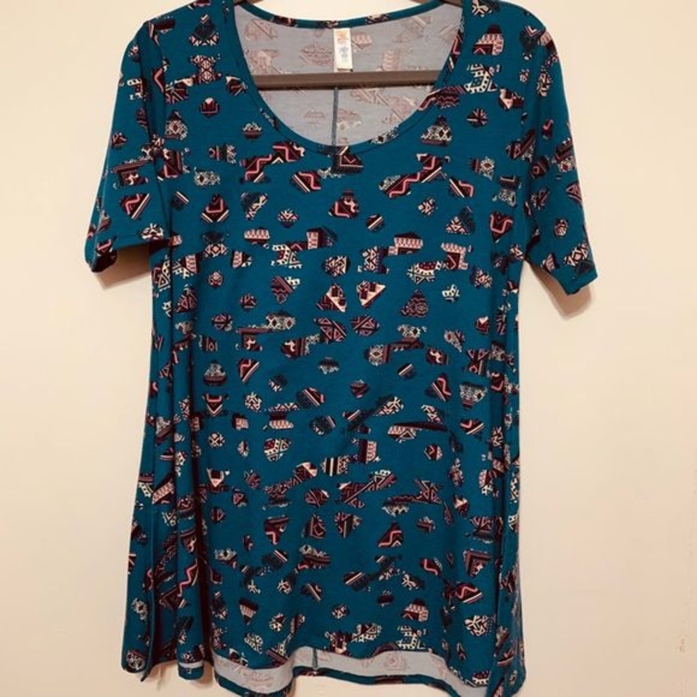 LuLaRoe turquoise top women short sleeve geometric relax blouse size XS